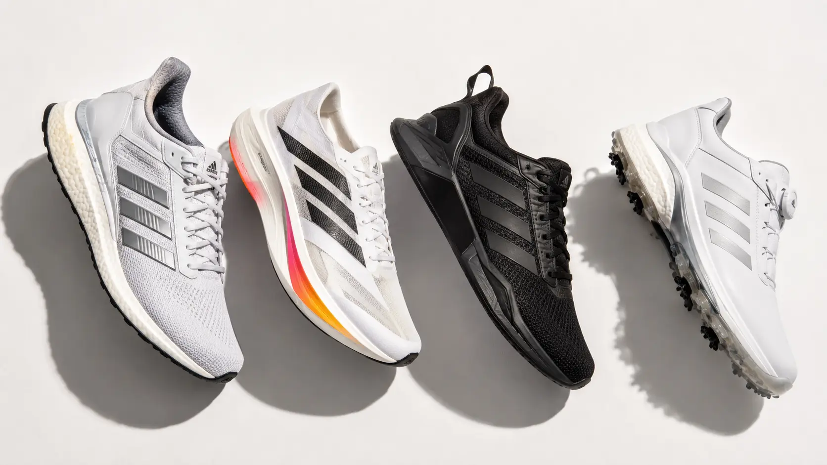 Flat lay of Adidas running, gym and golf shoes on a clean white background &mdash; best Adidas shoes 2026