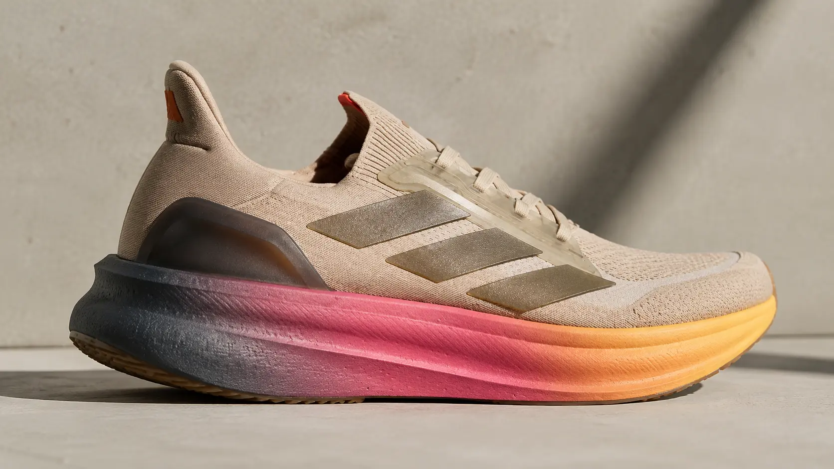 Side view of Adidas Ultraboost 5X showing Lightboost midsole and heel support structure