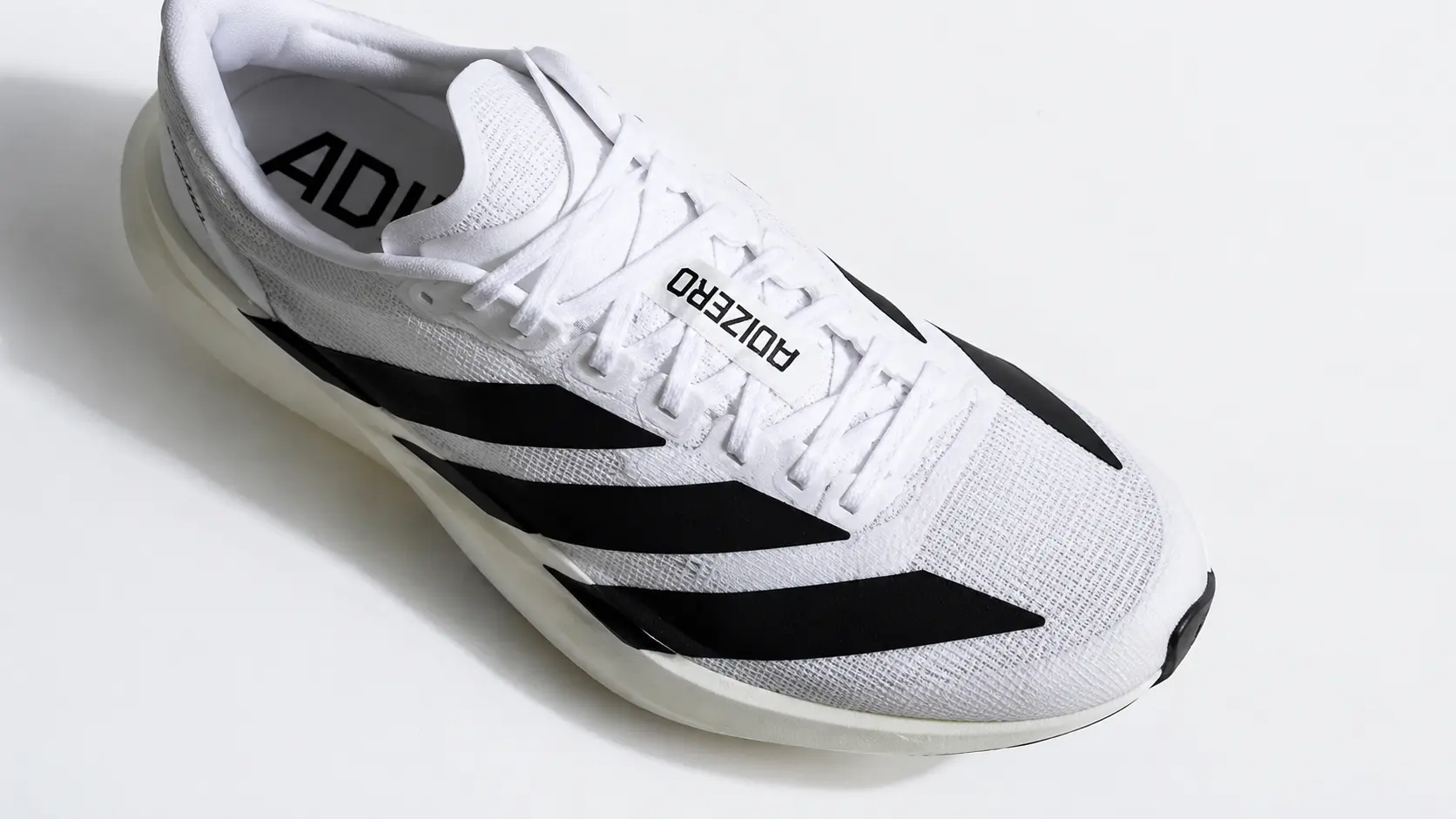 Top-down view of Adidas Adizero EVO SL showing tapered toe box for fit comparison