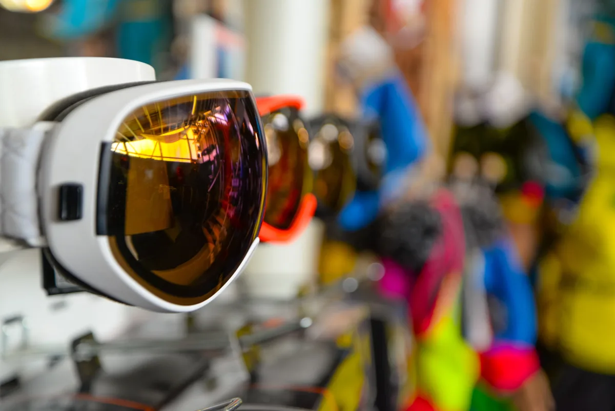 Colorful sport goggles displayed in an outdoor gear shop