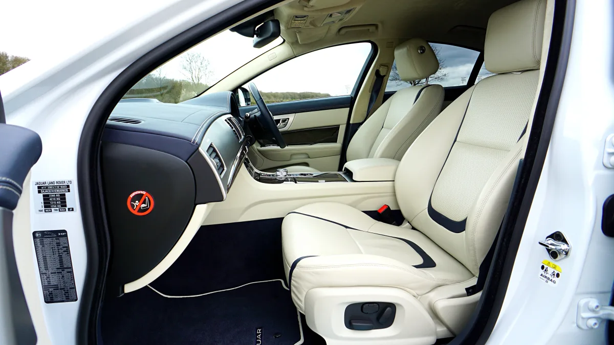 Premium leather Jaguar XF interior design with floor mat detail