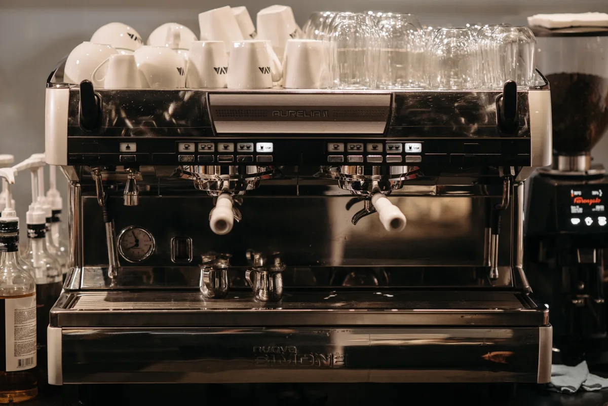 High-quality espresso machine in a coffee shop setting — best all-in-one hybrid coffee makers 2026