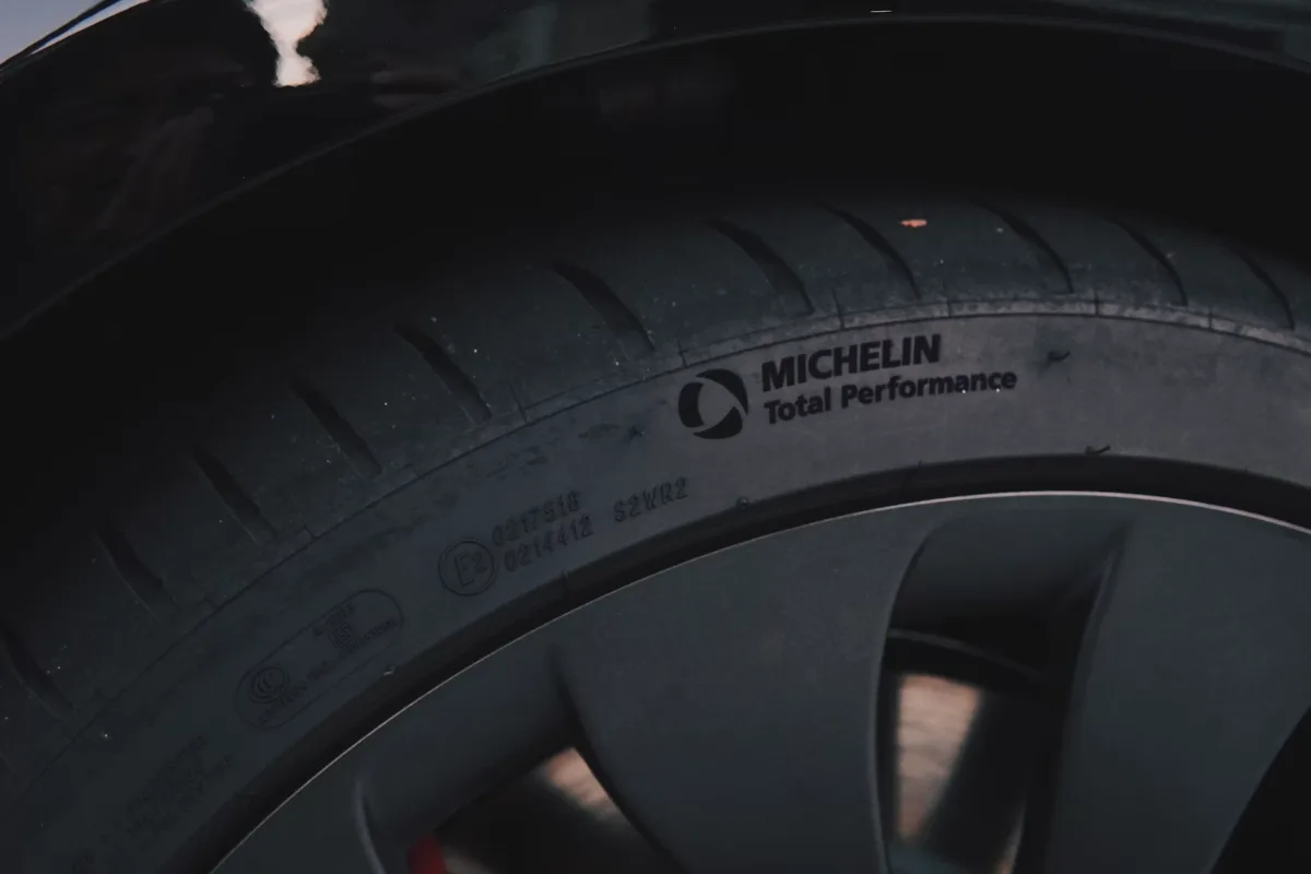 Close-up of Michelin tire tread on a car wheel
