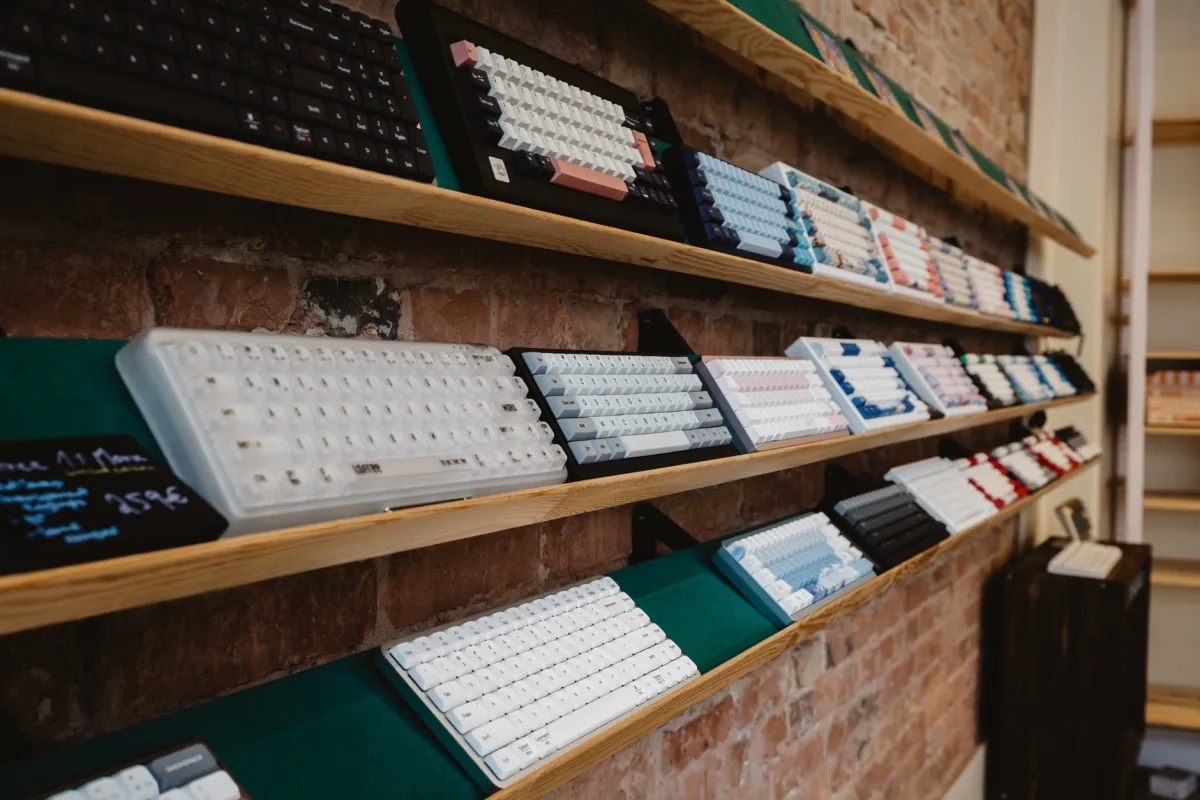 Mechanical keyboards displayed on shelf in store interior