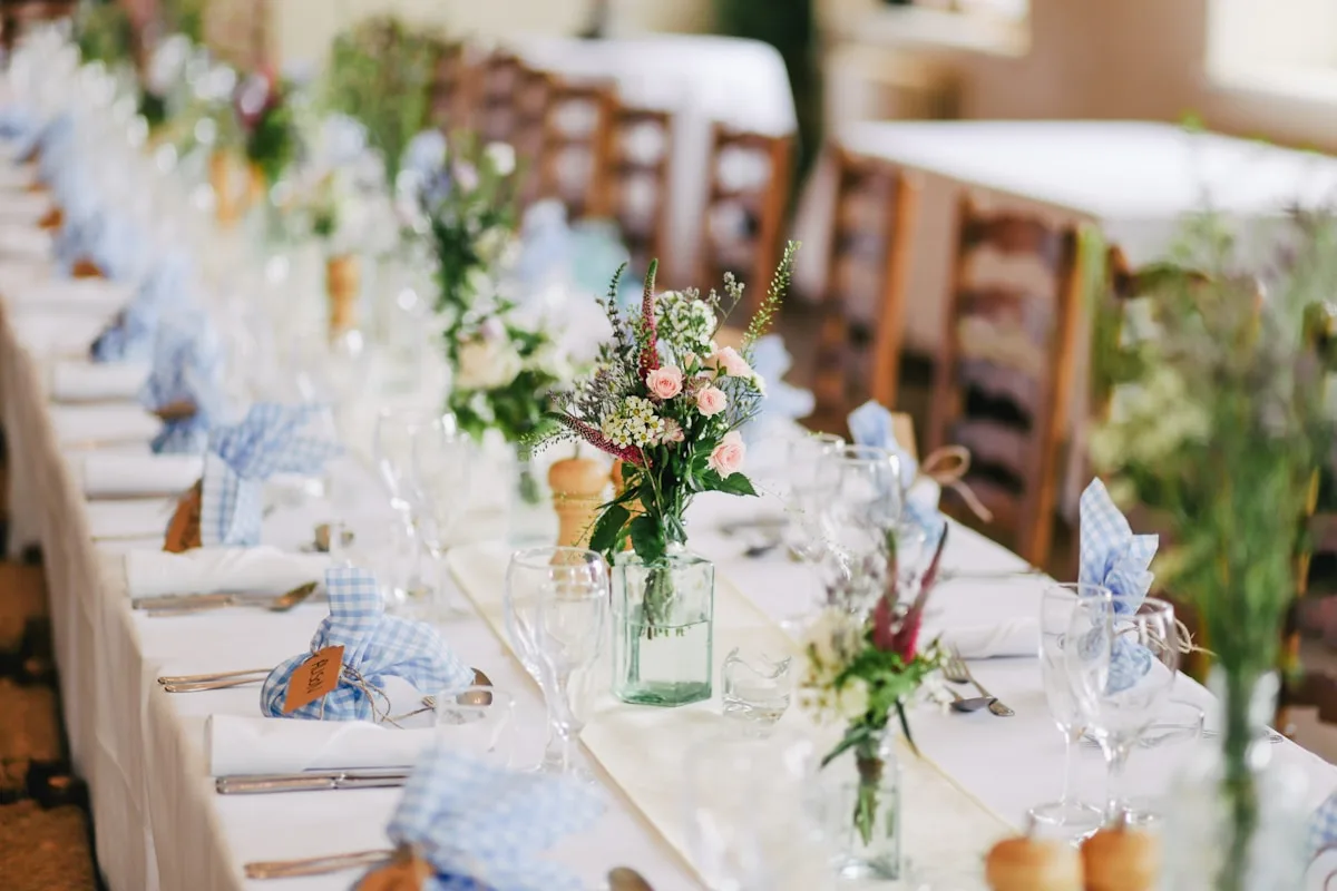 Elegant wedding reception table with flowers and candles