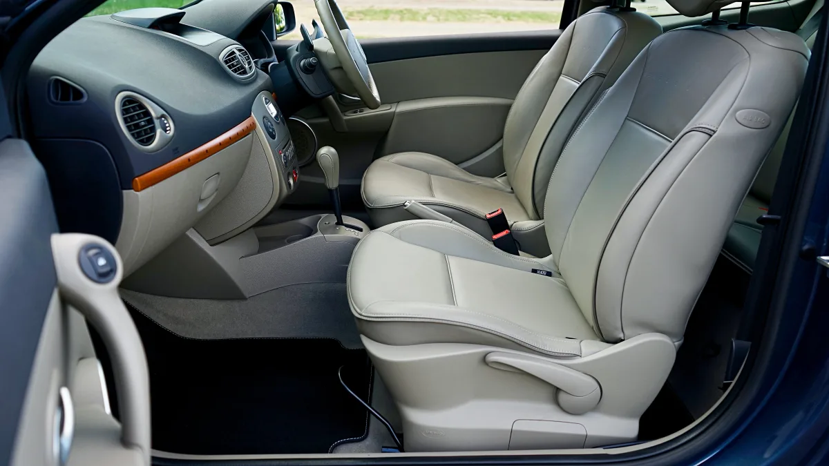 Luxurious beige leather car interior and dashboard