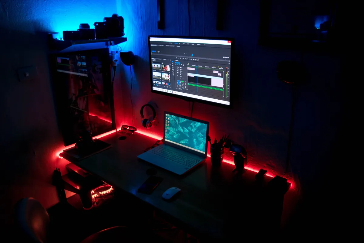 Cozy home office setup with ambient LED lighting and monitor