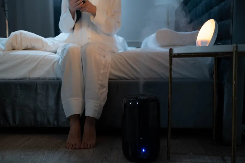 Bedroom with humidifier mist and soft lighting