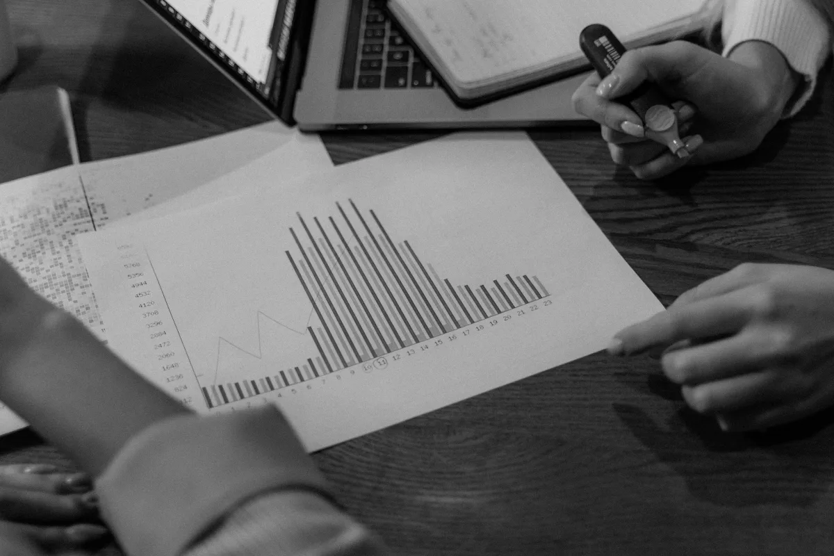 Insurance or financial professionals reviewing documents in office