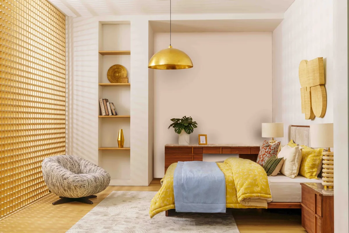Cozy bedroom with layered bedding and natural light