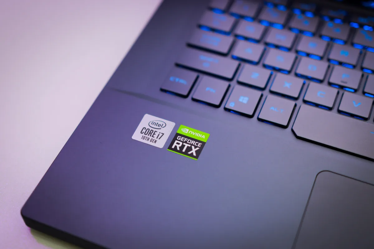 Laptop keyboard with Intel Core i7 and NVIDIA GeForce RTX stickers — best gaming laptops 2026 performance price portability