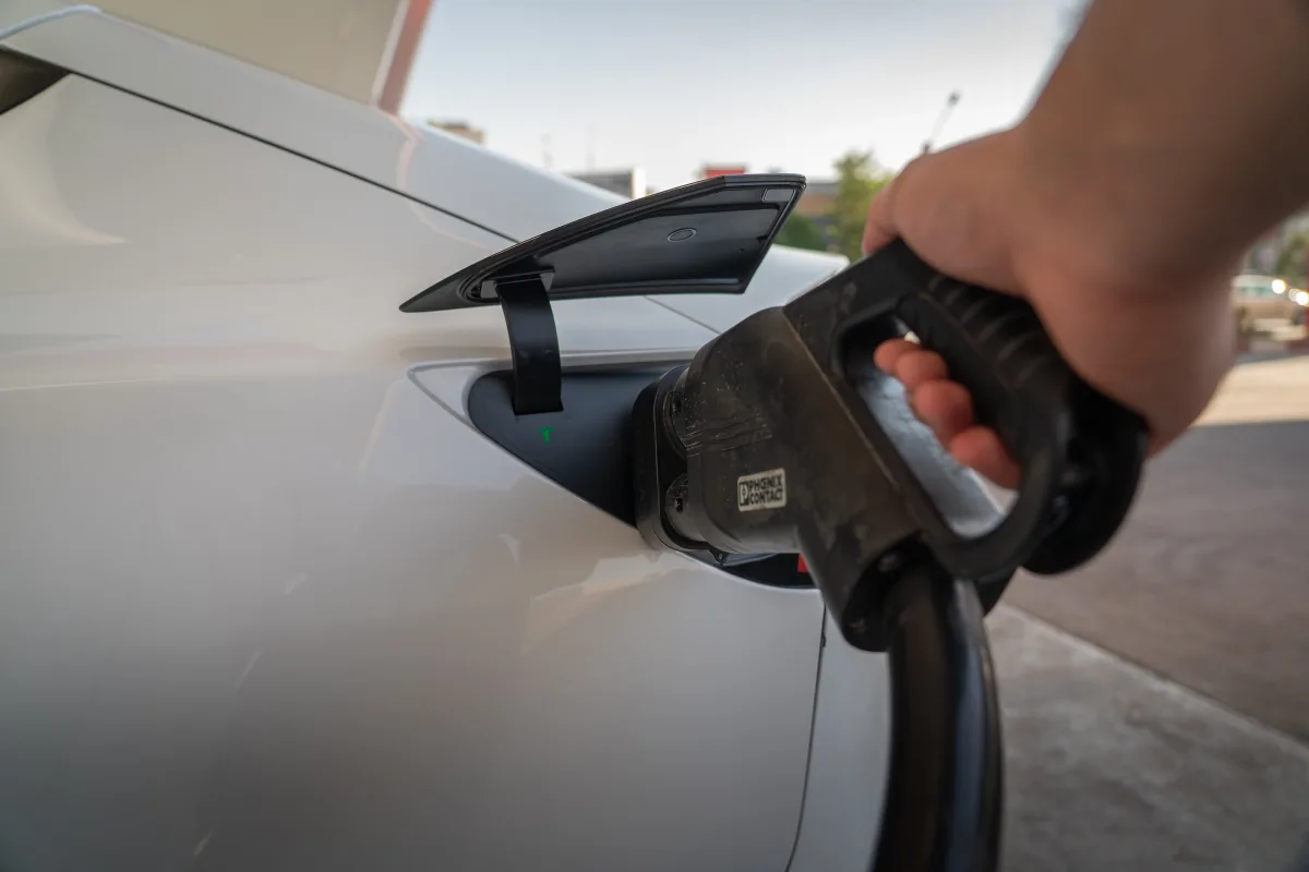 Close-up of electric car being charged