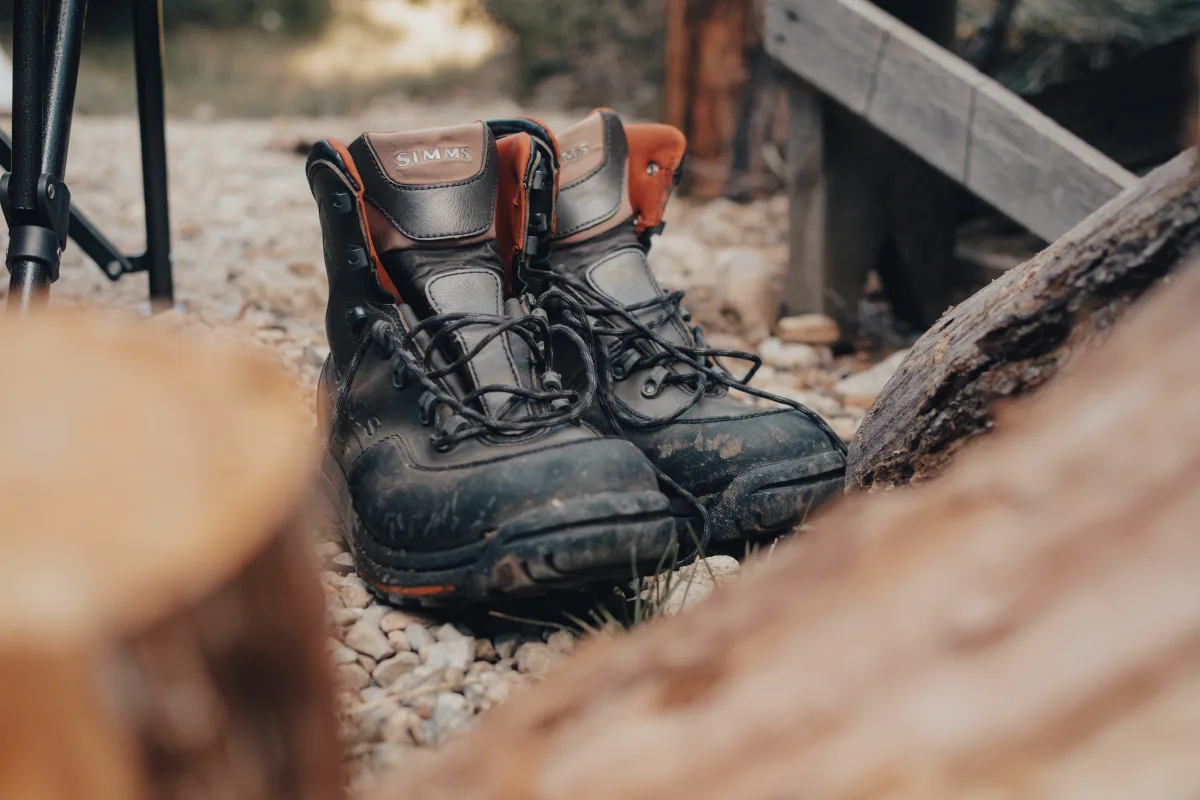 Detailed view of a fitted backpack being adjusted on trail