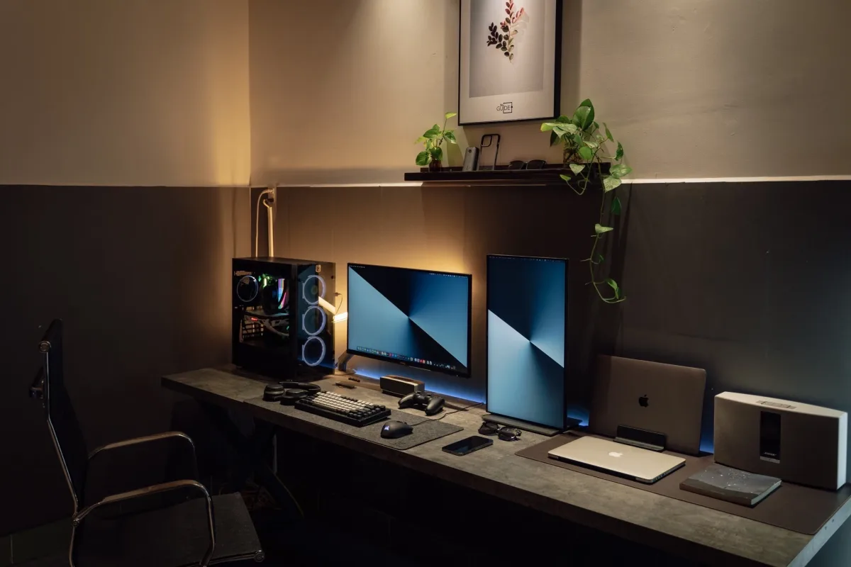 Modern gaming PC desk setup with dual monitors and cable management