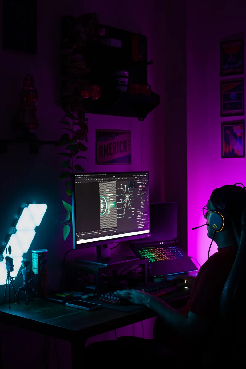Immersive night gaming setup with purple RGB neon lighting — gaming laptop GPU RTX 5070 5080 specs guide 2026