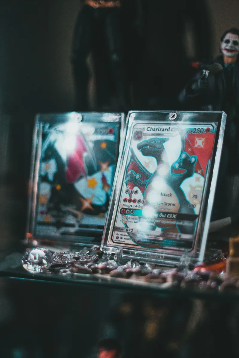 Trading card display shelf showing collectible card packs