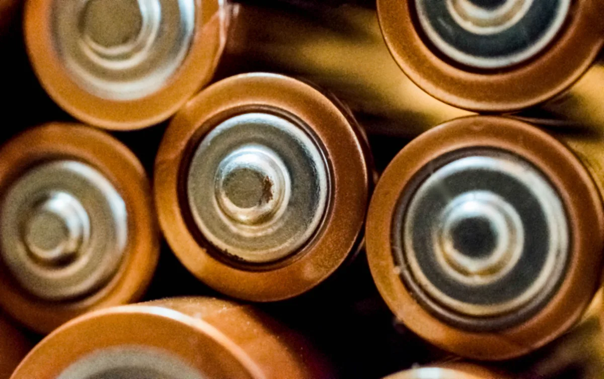 Close-up of cylindrical batteries — replaceable battery tracker durability