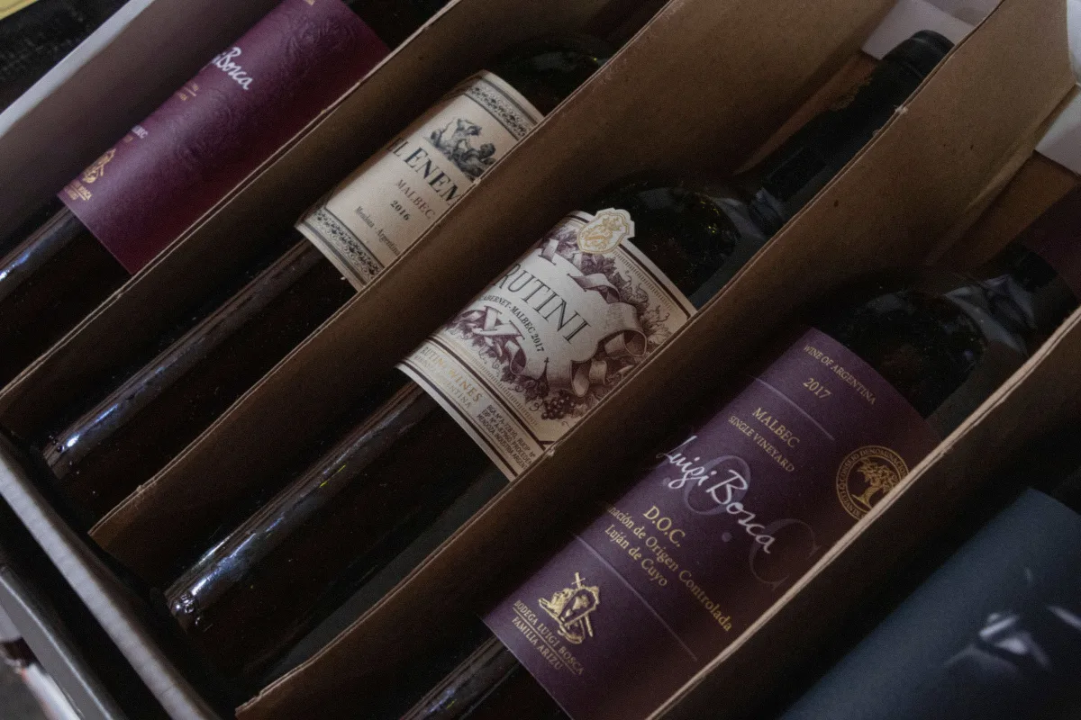Assorted wine bottles in a subscription delivery box ready to ship