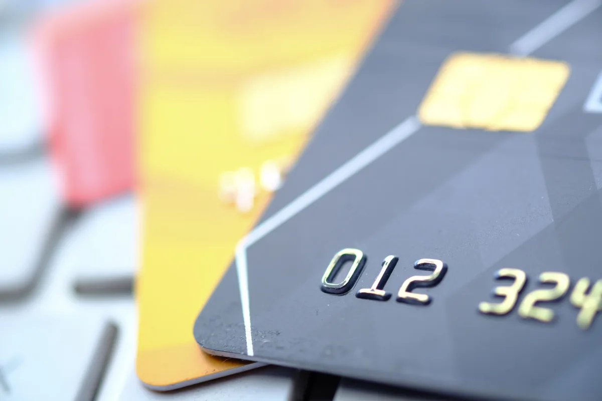 Close-up of credit cards showing chip and contactless technology