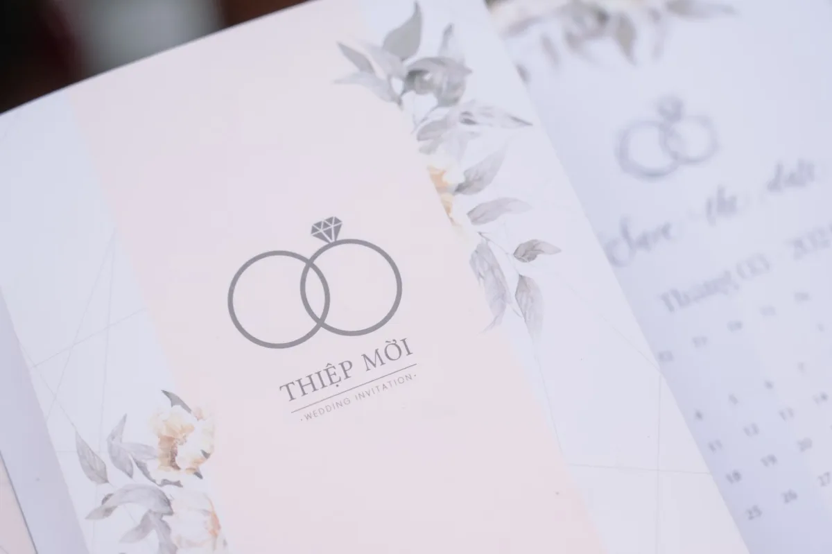 Pastel floral wedding invitation with elegant typography