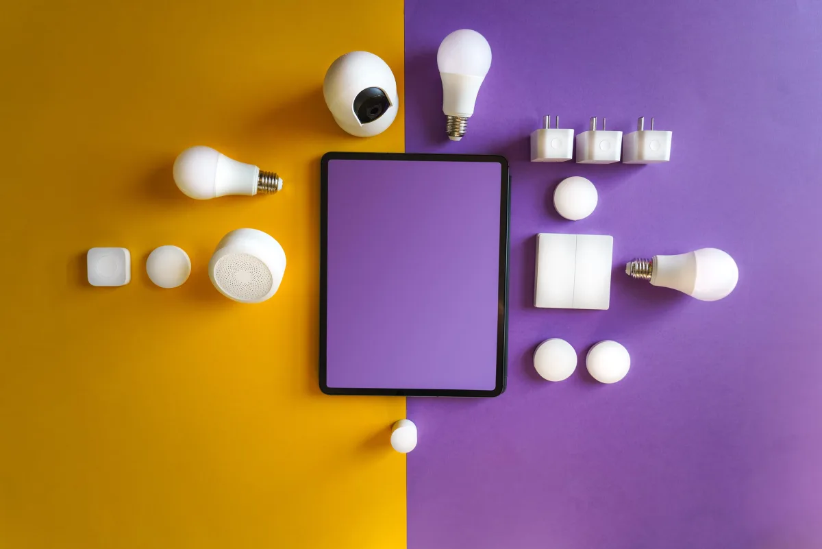 Smart home devices flat lay on yellow purple background — smart home network Wi-Fi Zigbee Z-Wave Matter setup