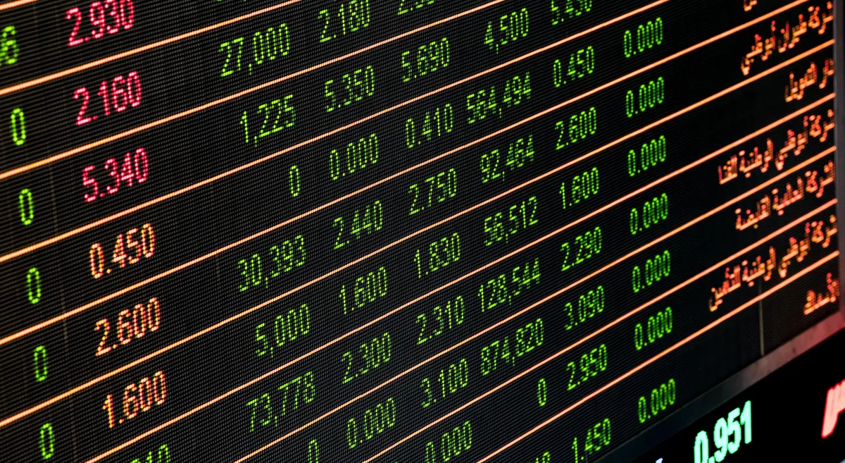 Stock market numbers and financial data on monitor screen