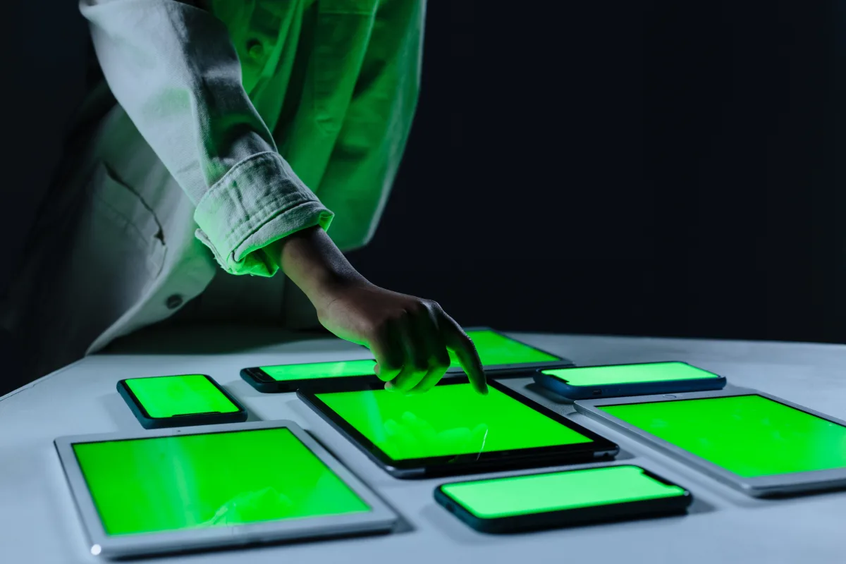 Hand interacting with smart home control tablets
